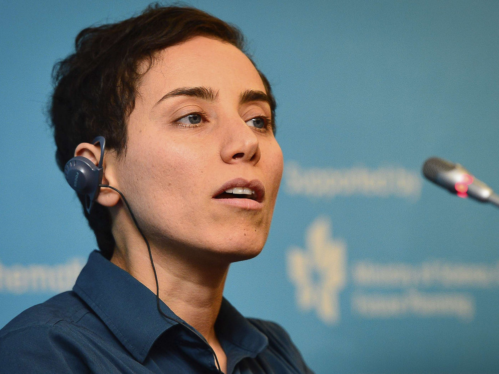 Iranian mathematician Maryam Mirzakhani speaks during a news conference after the awards ceremony at the International Congress of Mathematicians 2014, in Seoul