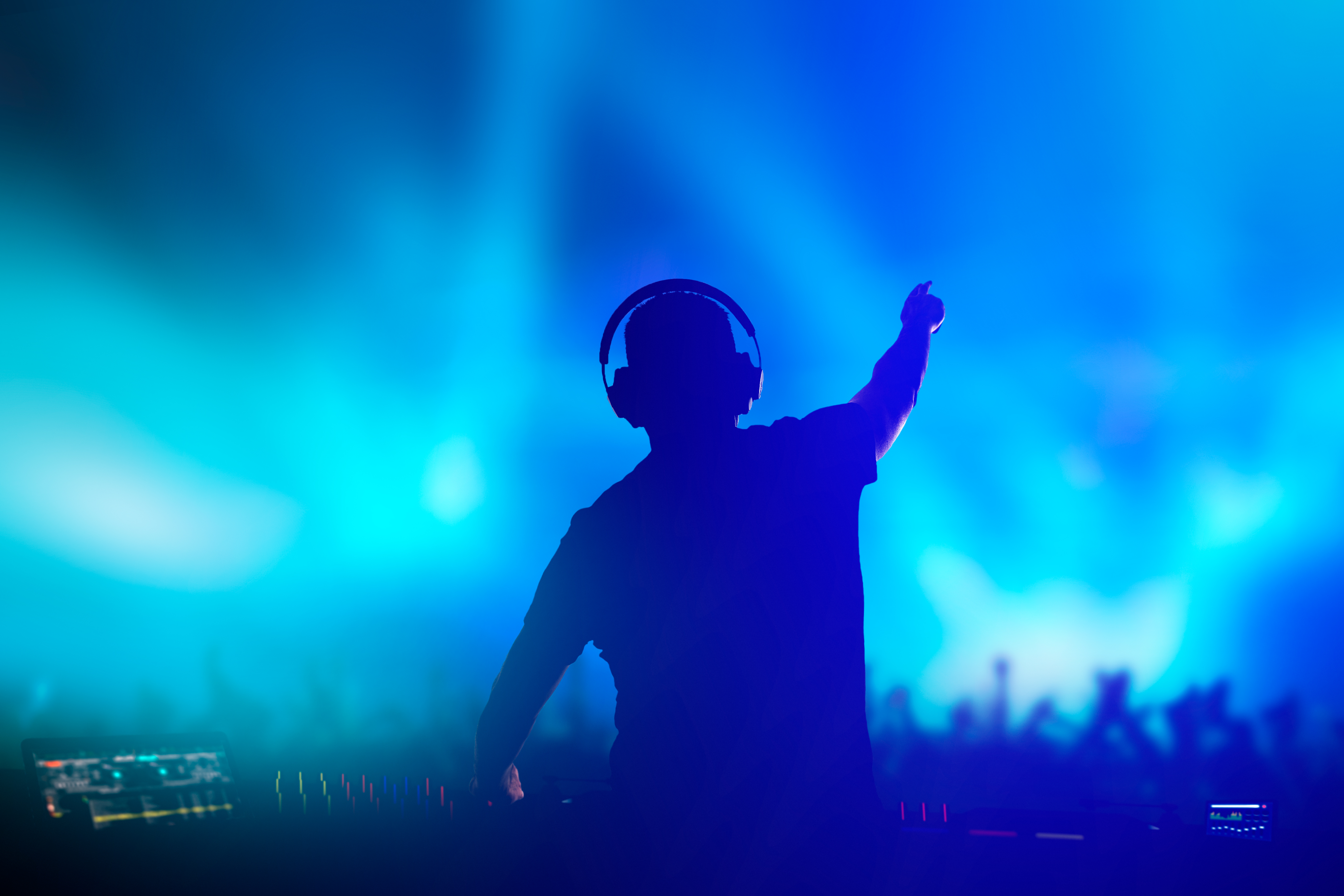 Charismatic disc jockey at the turntable.