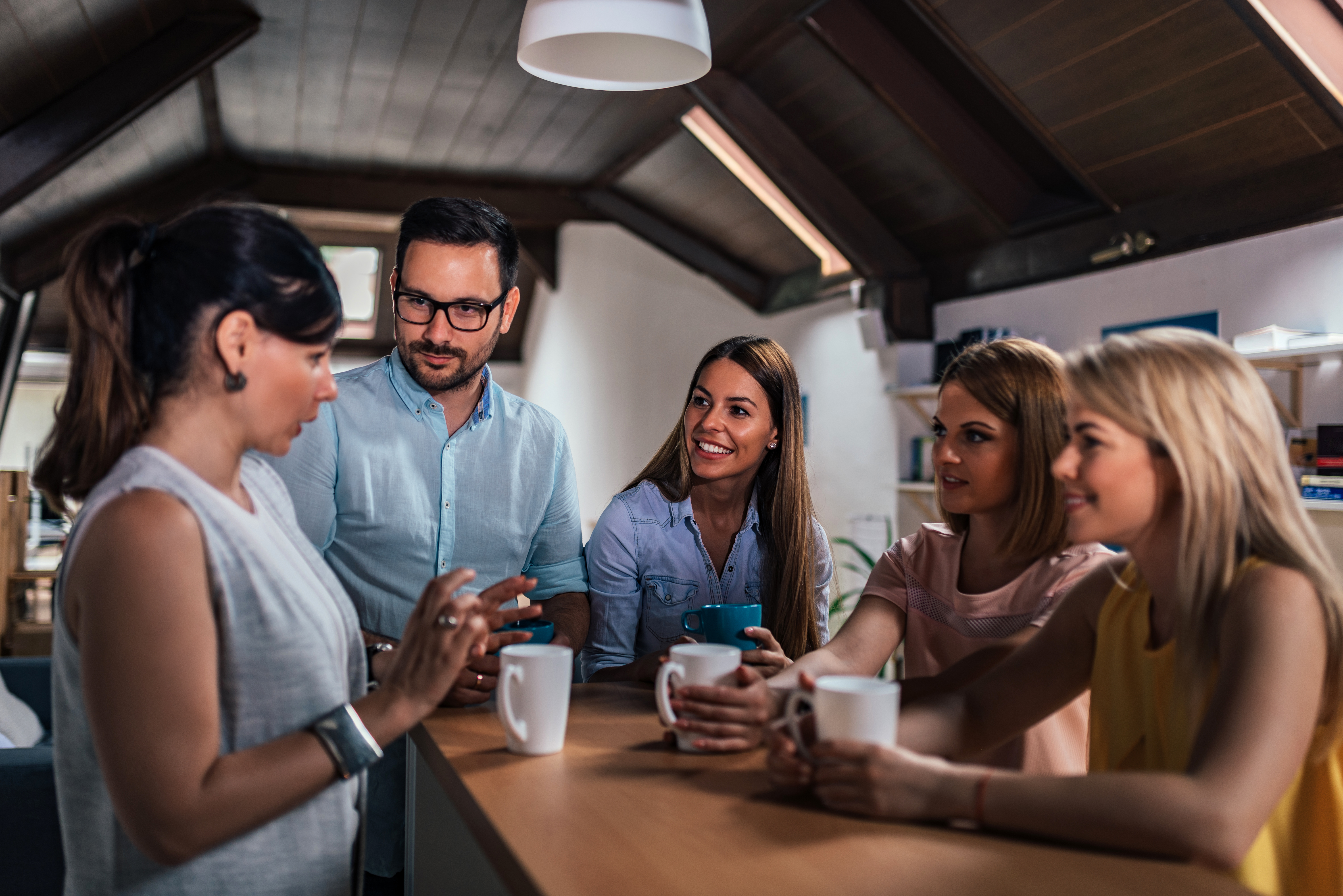 Coworkers having coffee break..jpeg