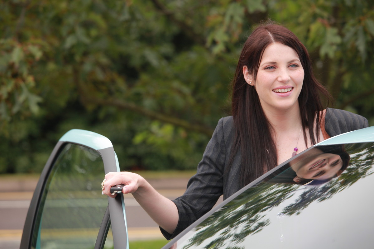 Lady getting into car