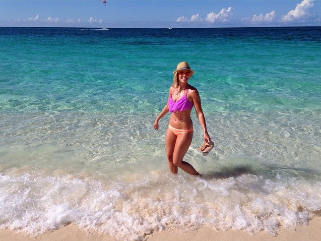 woman smiling in the water of the bahamas.jpg